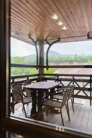 Гостиница Терем у реки Каменномостский 3-х местный двухкомнатный номер-10