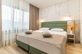 Гостиница Терем у реки Каменномостский 3-х местный двухкомнатный номер-1